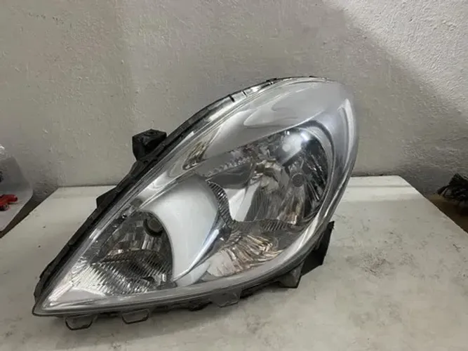 Farol Nissan Versa 2011 2012 2013 26021405 Esquerdo/motorista Esquerdo