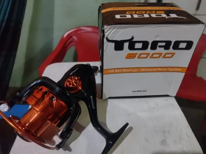 Vara de pesca e molinete, vara Albatroz 4,20mts e molinete Toro 6000 novos, não usei , já 