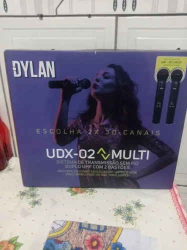 Vendo microfone novinho sem marca de urso um ano de garantia da loja