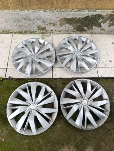 Jogo de calotas genuína Peugeot aro 15.