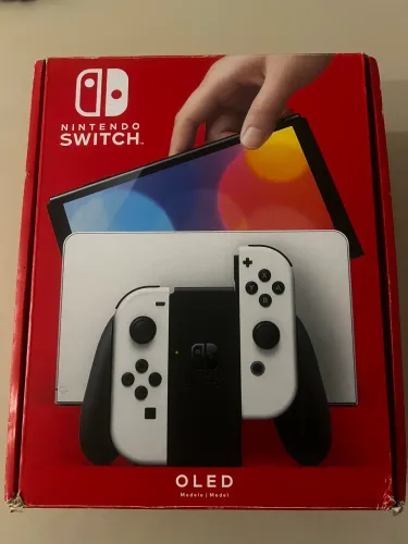 Caixa vazia do Nintendo Switch Oled com berço