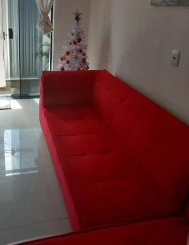 Sofá de canto bem conservado.