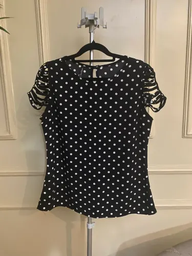 Blusa Dy clara poá preta M