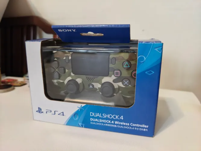 Controle PlayStation 4 Camuflado, em muito bom estado, praticamente sem uso 
