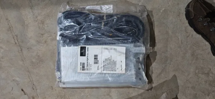 Trava baú e CJ espiral cavalo Autotrac Nova na embalagem