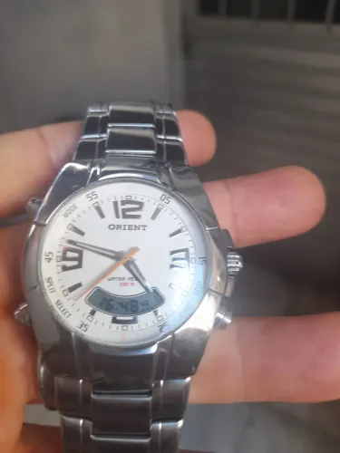 Vendo um relógio orient dois em um funcionando perfeitamente 