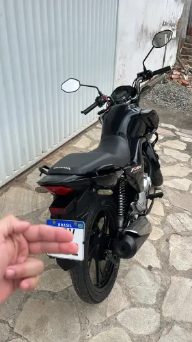 Moto extra no ponto de transferir