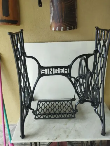 Pé de máquina singer 