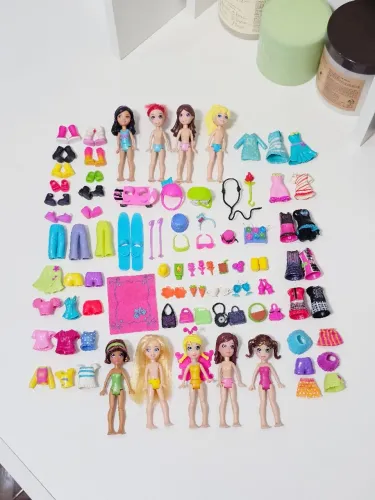 Lote Polly Pocket e acessórios anos 2010-2012