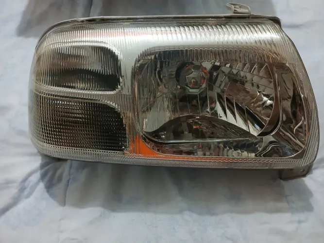 Farol  vitara gm Tracker lado direito 2001 a 2009