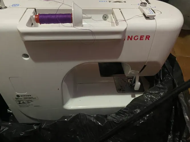 Máquina de costura singer