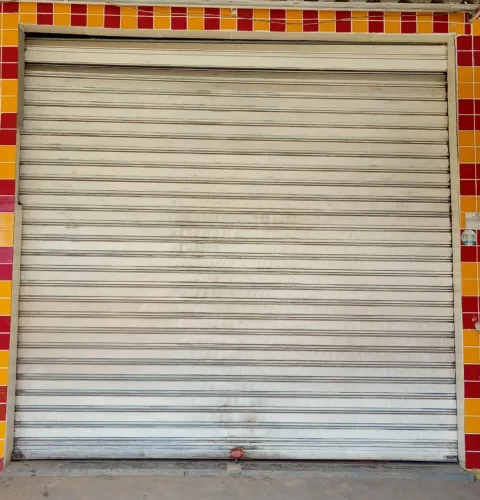 Vendo porta de loja em ótimas condições