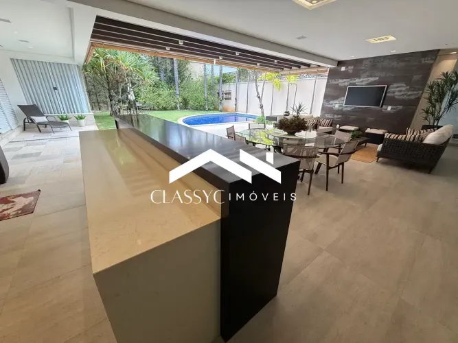 Casa em condomínio fechado 3 suítes, piscina, cinema, academia, 525 m² construídos- Jardim