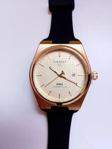 Tissot PRX dourado
