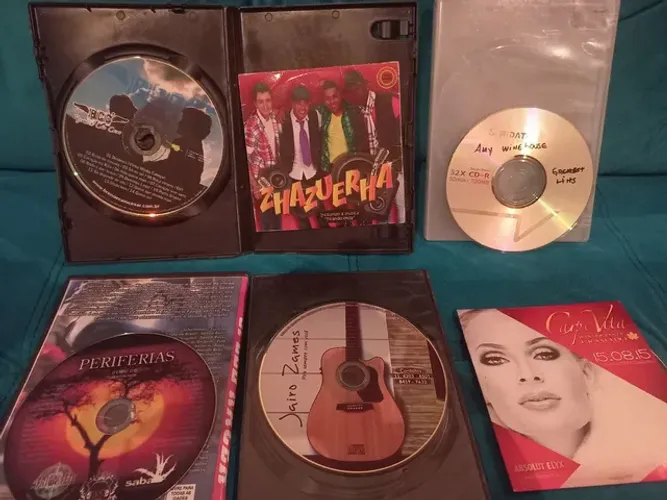 Cds e DVDs 2 real cada
