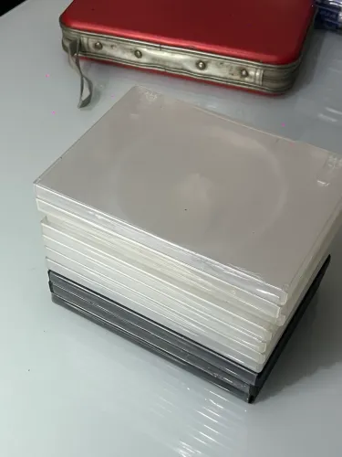 LOTE 10 capas duras de DVD e PS2 (com travas ok!!)
