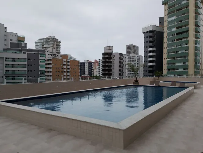 Apartamento para locação na Guilhermina, Praia Grande-SP: 2 quartos, 1 suíte, 2 salas, 2 b