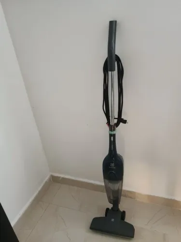 Doação aspirador de pó funcionando 