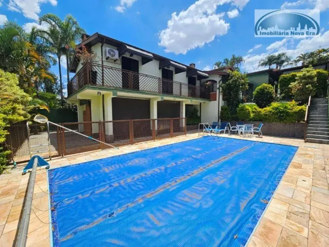 Casa com 4 dormitórios à venda, 378 m² por R$ 2.290.000,00 - Condomínio Marambaia - Vinhed