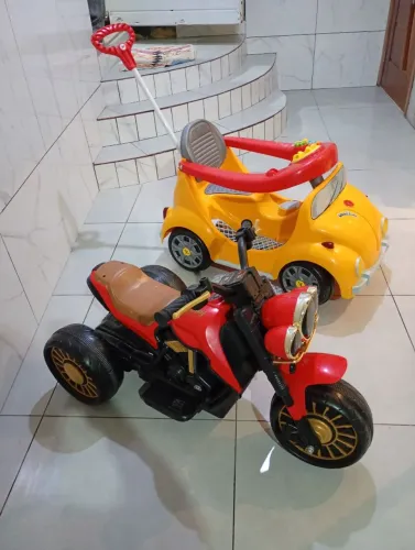 Vendo junto ou separado moto elétrica infantil e Fusca de passeio infantil muito novo