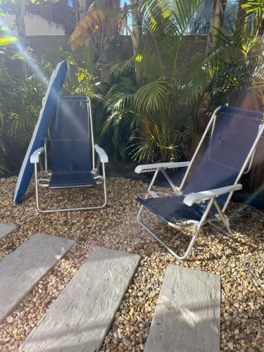 Guarda sol e cadeiras de praia