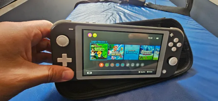 Nintedo switch lite com jogos na memoria 128gb desbloqueio com chip