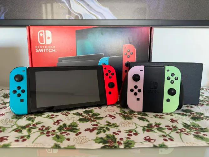 Nintendo Switch 1 nacional + joy-con roxo e verde + case geekshare