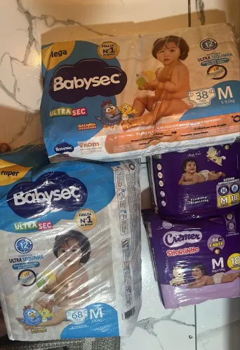 Kit fraldas M, baby sec e Cremer 