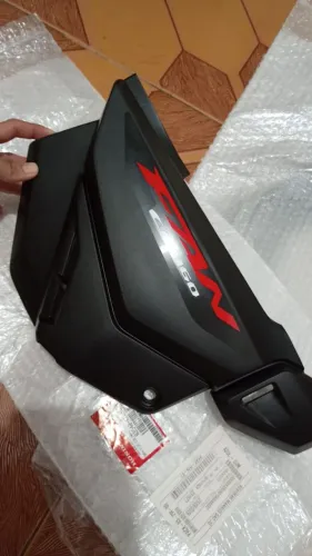 Tampa lateral, novo nunca usado da Honda original, vendo as duas por 500, fez o Pix é seu 