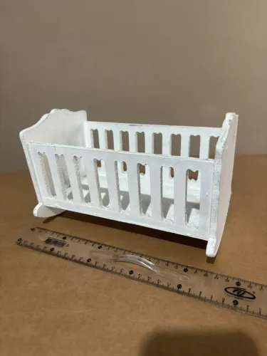 Mini berço para enfeite de mesa em festa infantil