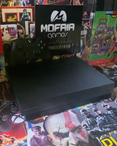 Xbox one x 2tb4k seminovo com garantia três meses dois jogos de brinde 