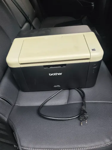 Impressora Brother HL-1202 com pequeno problema