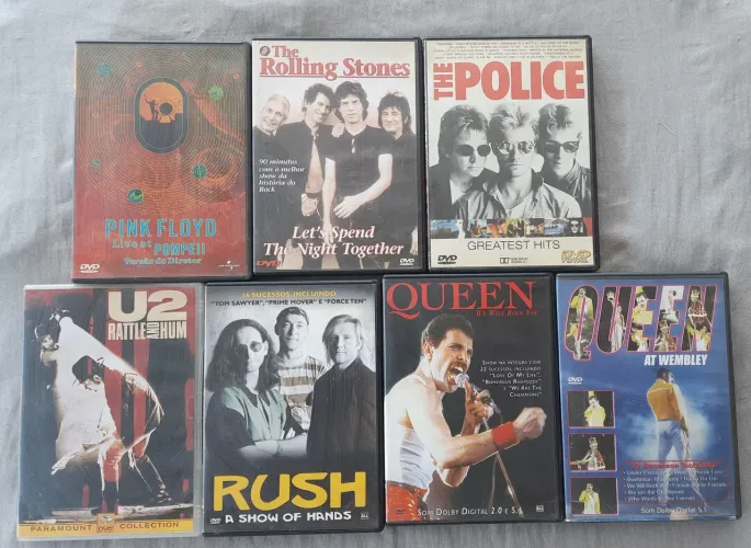 Lote com 7 DVDs de bandas internacionais.