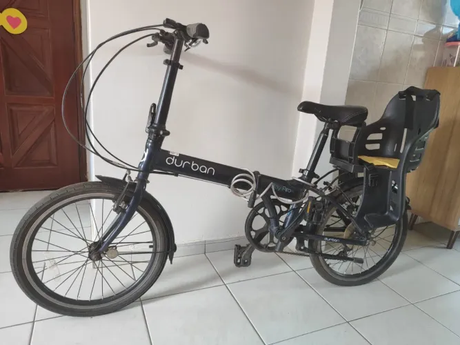 Bicicleta Dobrável Durban Bay Pro 6 Marchas + Cadeirinha Infantil - R$ 1.800