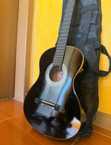 Violão (Acompanha bag e palhetas)
