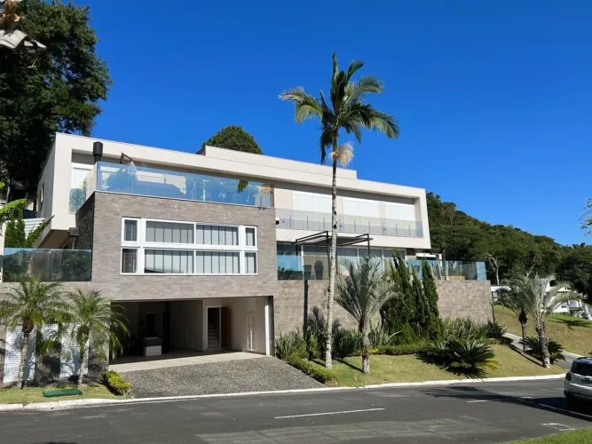 Casa condomínio fechado com 4 suítes para alugar, 600 m² Barra Balneário Camboriú