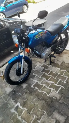 Moto CG 99 impecável.