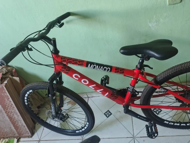 Vende - se Bicicleta Colli Mônaco Aro 26 Disco 21 V Rápido Fire Cor Vermelha ,Semi Nova