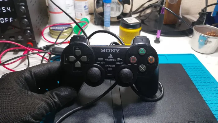 Controle original PS2, limpeza e higienização feita funcionando perfeitamente