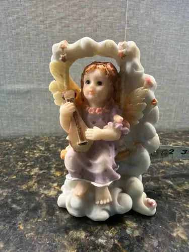 estatueta anjo com violão resina