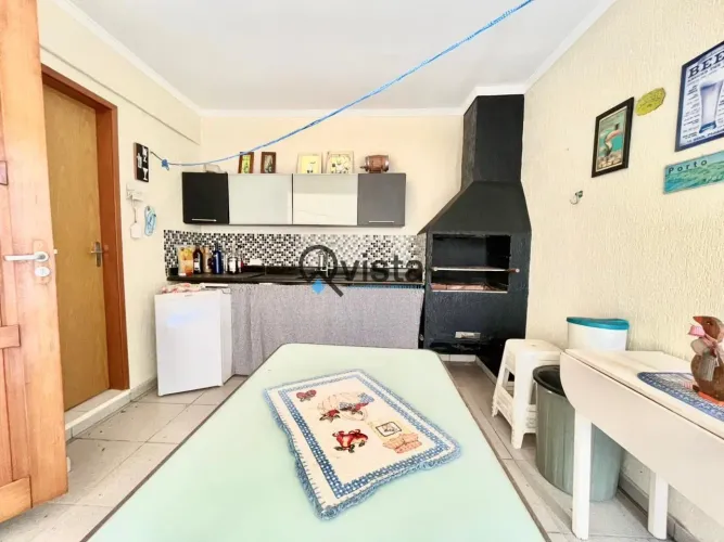 Casa à Venda no Tombo no Guarujá | QVista Inteligência Imobiliária