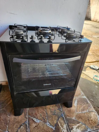 Vendo Fogão 5 bocas de vidro super conservado , marca continental