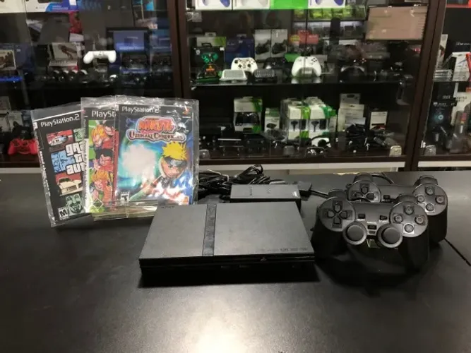 PlayStation 2 Slim Preto Usado 02 controles com fio/05 jogos físicos de brinde.