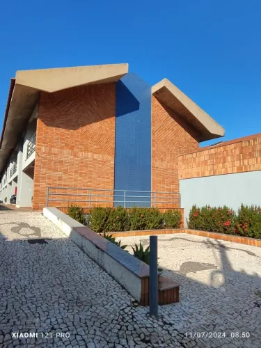 Apartamento na Avenida Afonso Pena 7554, com dois quartos, sacada, sala e cozinha, garagem