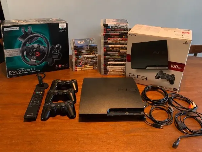 ps3 slim 160gb + 36 jogos + 3 controles + volante Logitech Driving Force GT + acessórios