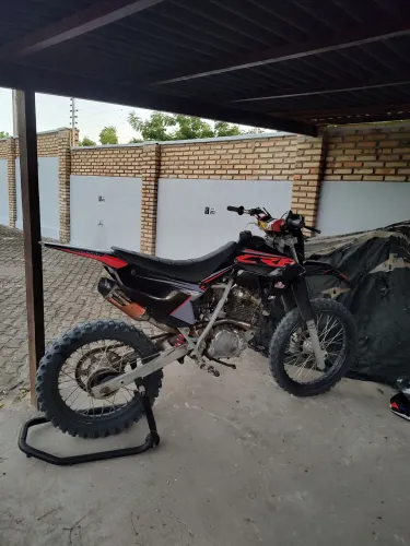 Xr 200 preparada trilha