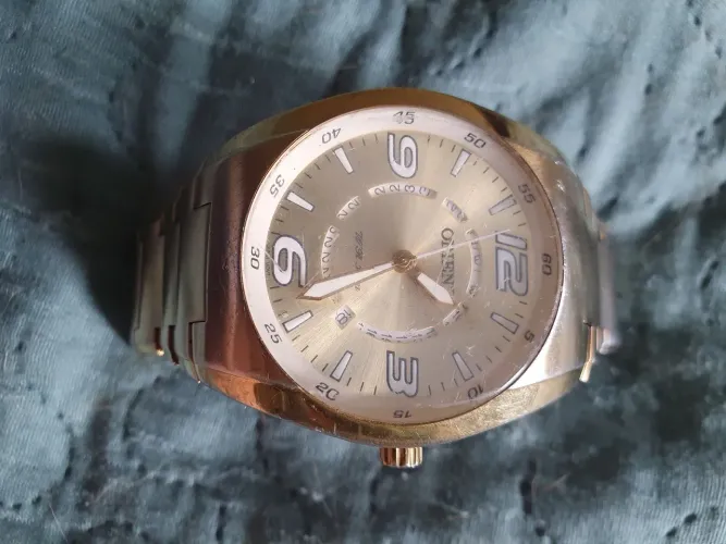 Relogio orient original dourando 