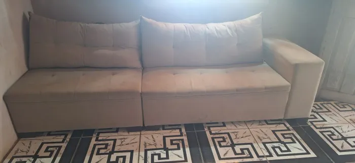Sofá de canto com puff