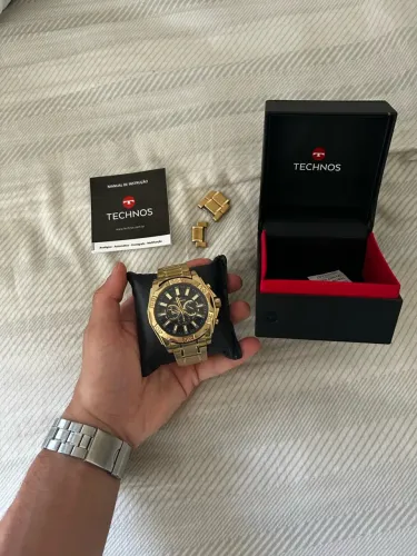 Relógio Technos, em detalhe dourado e perfeitas condições