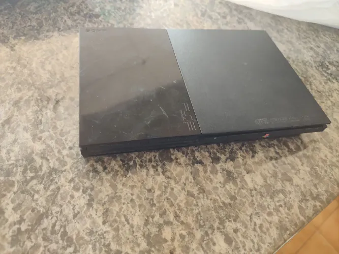 PS2 super slim defeito liga e desliga 